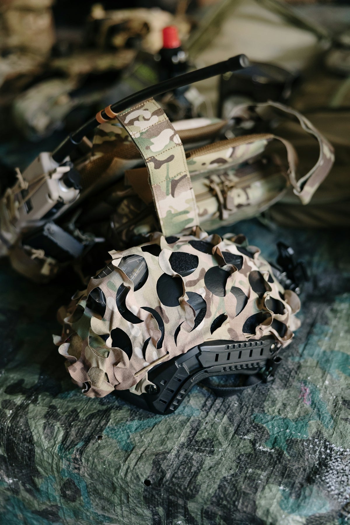 Military helmet and tactical gear camouflage