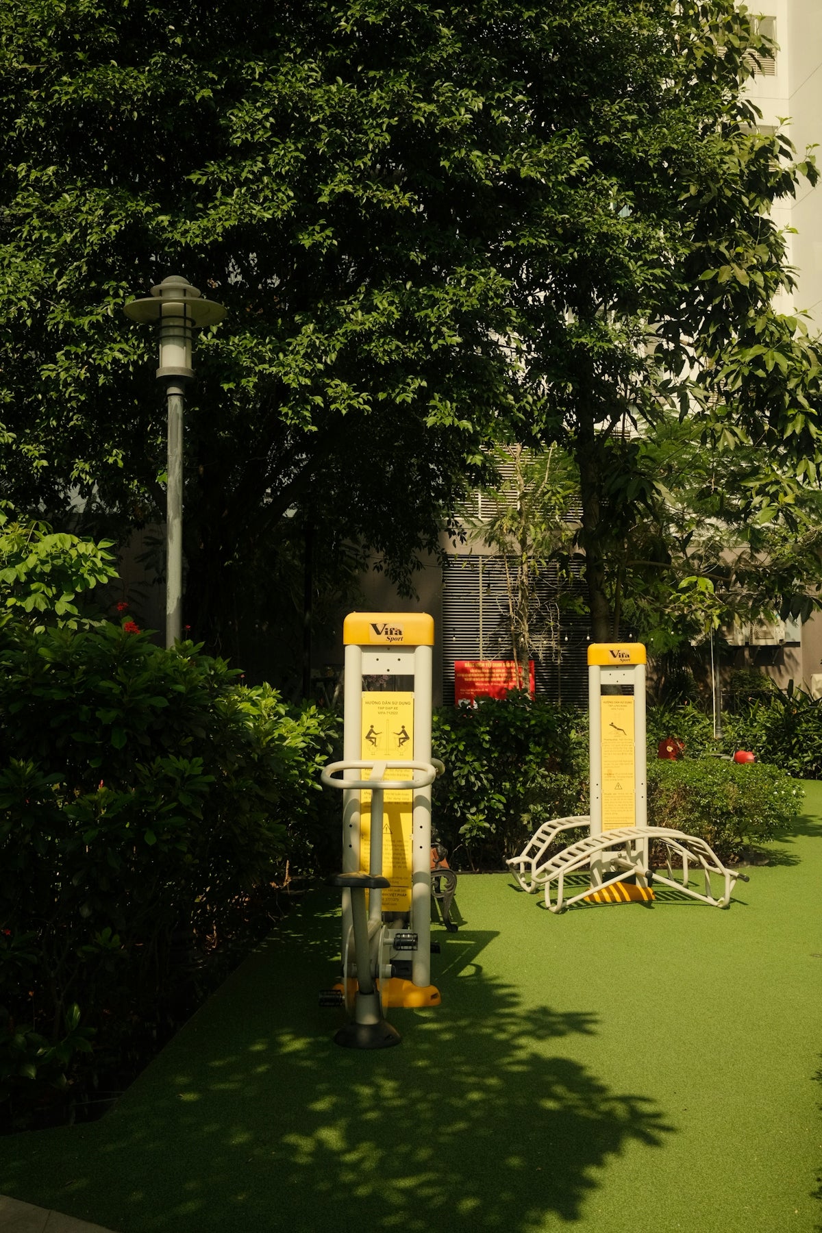 Outdoor gym equipment on green artificial turf